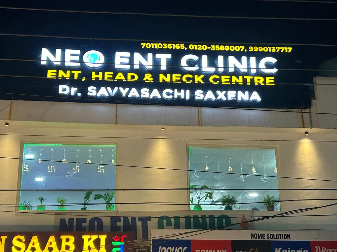 Illuminated NEO ENT Clinic signboard above the clinic in Indirapuram, Ghaziabad